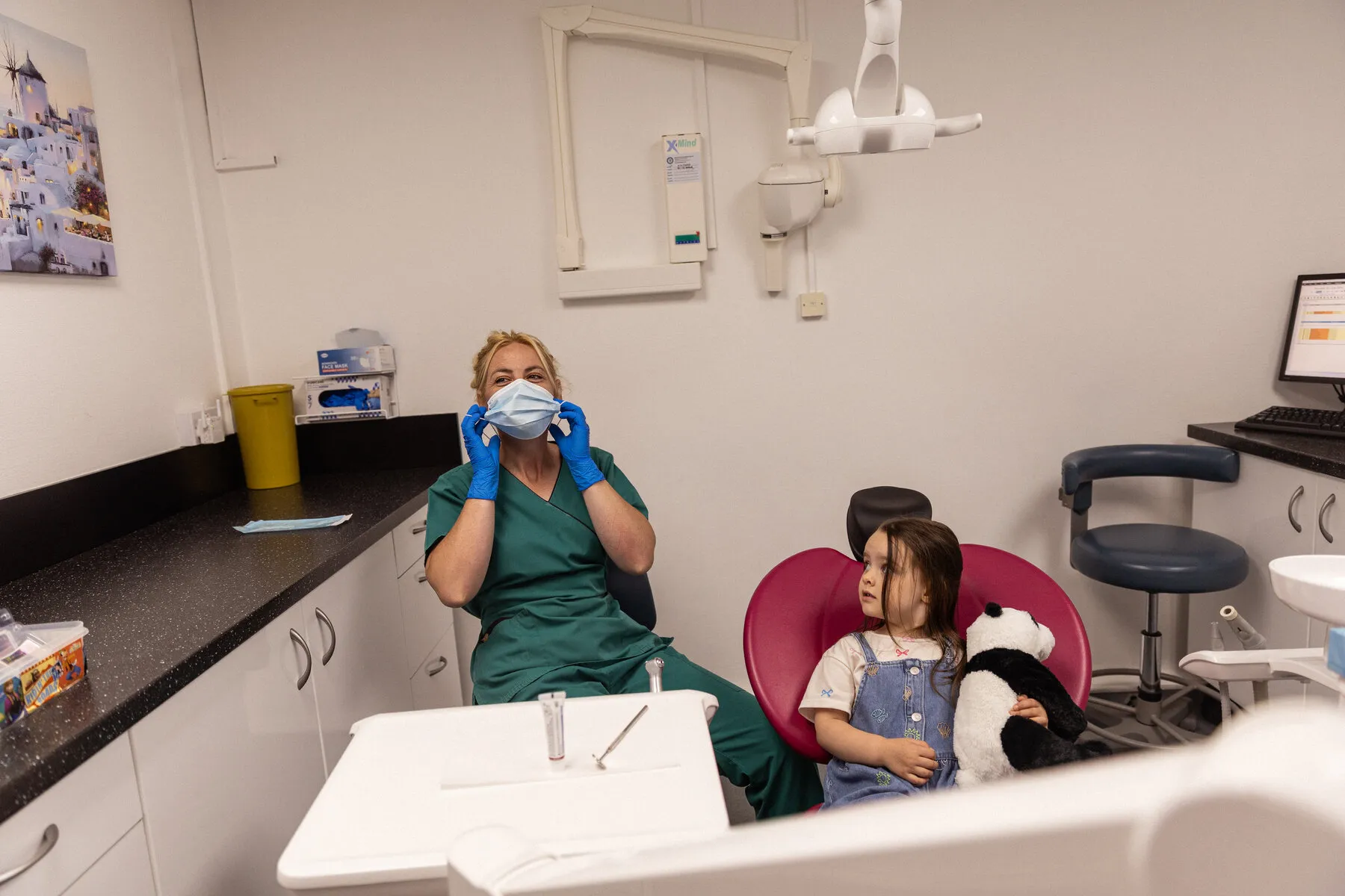 Dental nurse treating a young patient, families welcome at Charles Street Dental Surgery